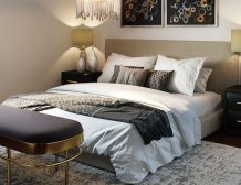Elegant bedroom with neutral tones and textured bedding.