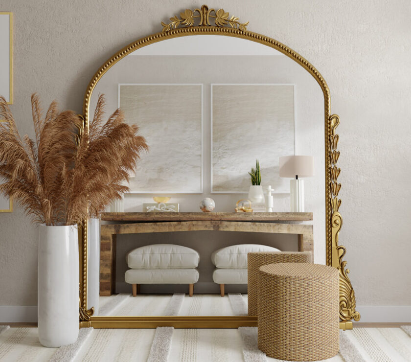 A stylish mirror reflecting a cozy room with neutral decor.