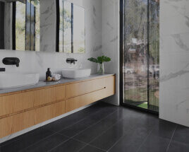Modern bathroom with wood vanity and large window.